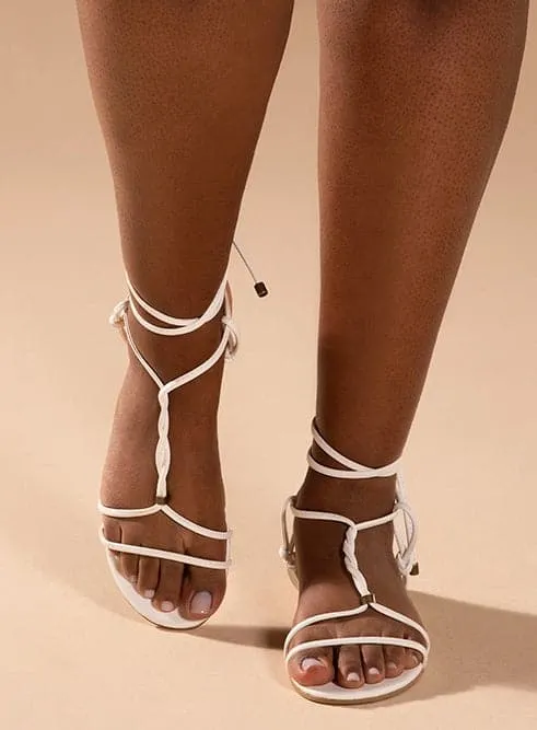 Flat centre-strap vegan sandal by Arenaria - white